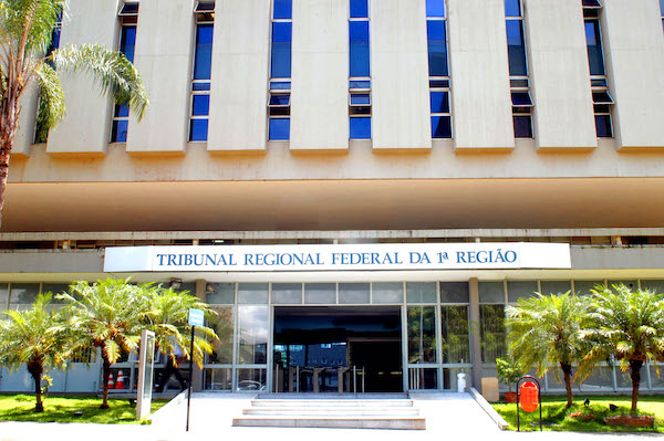 TRF1 - É válida notificação extrajudicial expedida por cartório de outra comarca por via postal e entregue no endereço do devedor com AR